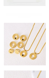 Detail of titanium jewelry set with flat snake chain necklace and square zircon stud earrings