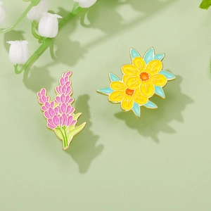 Floral enamel pins featuring lavender and yellow flowers in polished gold alloy metal