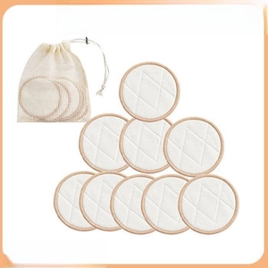 Eight reusable makeup remover pads with a white mesh drawstring bag in a complete set