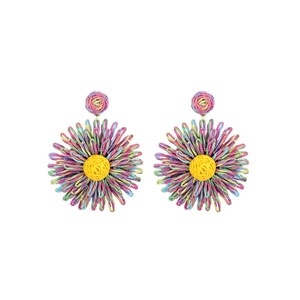 Detailed view of colorful handcrafted woven raffia flower earrings in summer vibrant tones
