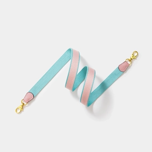 Adjustable sky blue canvas shoulder strap with pink stripe and gold metal clips
