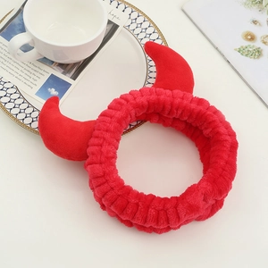 Cute red plush headband with cartoon devil horns for washing face and makeup routines