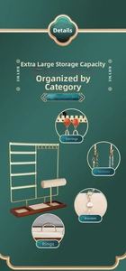 Detail view of golden jewelry stand featuring earring hooks and wooden base storage