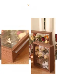 Macro detail of high transparency glass on a deep wooden frame for dried flower display