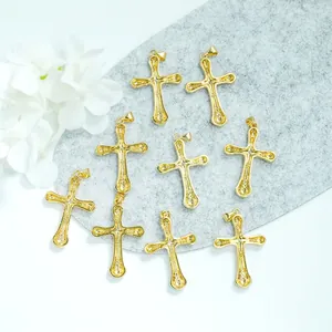 Nine 18K gold plated cross pendants with micro-pave crystals for jewelry making