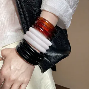 Three-layer geometric resin open bracelets in amber, white and black for women