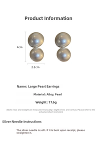 Detailed view of large pearl earrings with measurements 4cm height and 2.1cm width