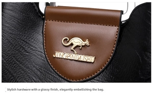 Detail of lychee textured leather tote with a gold kangaroo logo and smooth brown flap