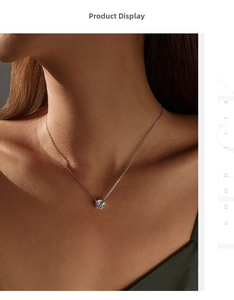 Detail of S925 sterling silver necklace with rose-cut diamond pendant on model neck