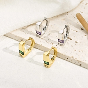 14k gold and silver plated brass earrings with cubic zirconia stones and Paris engraving