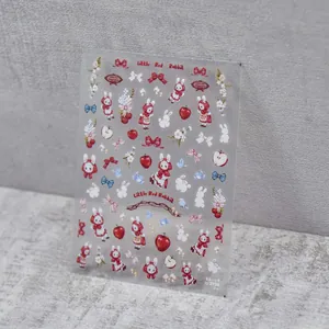 Detail of Little Red Rabbit nail art stickers with floral and apple patterns on PET film