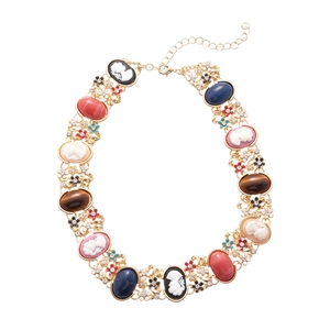 Vintage gold cameo necklace with multi-colored gemstones and floral crystal accents