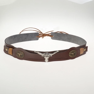 Detail of a brown faux leather cowboy belt featuring silver longhorn bull head metal buckles