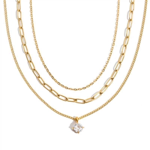 Ensemble de colliers superposés dorés avec chaîne trombone et pendentif zircon rond