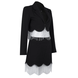 Women's black tailored blazer and skirt set featuring shimmering silver rhinestone fringe