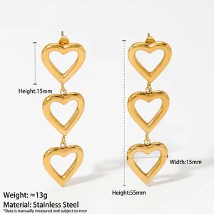 Élégantes boucles d'oreilles pendantes triple cœur en acier inoxydable 316 doré poli