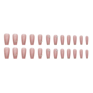 Faux ongles nude translucides avec paillettes argentées, perles et strass décoratifs