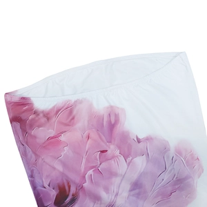 Detailed close-up of the neckline with pink floral print and fine double-needle stitching