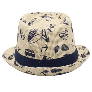 Detailed view of beige straw fedora featuring navy nautical prints and a classic ribbon band