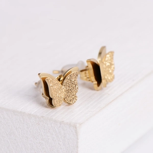 Minimalist double-layered gold butterfly stud earrings with frosted glitter finish