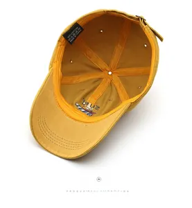 Detail view of cotton baseball cap interior showing stitching and breathable vents