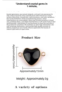 Detail view of 15mm black heart gemstone connector with gold metal rim and dual loops