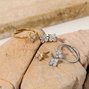 Elegant stainless steel flower zircon jewelry set including adjustable rings and earrings