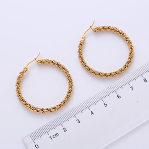 Classic gold twisted hoop earrings with fine woven texture and 4cm diameter size