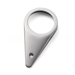 Detail view of brushed silver teardrop metal bottle opener with dual mounting holes