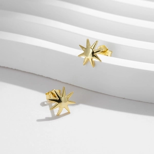 Minimalist gold S925 silver star stud earrings with a shiny metallic sunburst shape