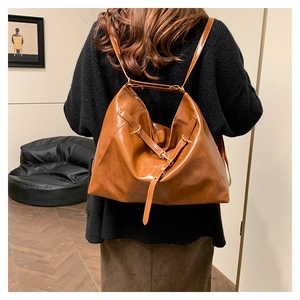 Maillard caramel brown leather multi-functional large capacity backpack on a model