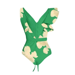 Green V-neck one-piece swimsuit with ruffle shoulder and botanical leaf print design
