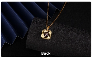 Detailed back view of golden necklace pendant with square purple stone inlay