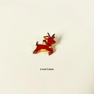 Detailed view of red Christmas reindeer enamel brooch pin showing size 2.1cm by 2.8cm