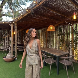 Boho two-piece set featuring embroidered tie-up sleeveless top and wide-leg trousers