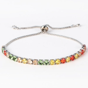 Close-up of silver adjustable bolo bracelet featuring vibrant square-cut colorful zircons