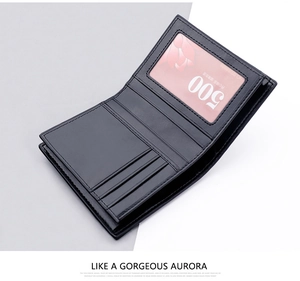 Detailed interior of a black leather bifold wallet with multiple card slots and an ID window