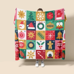 Detail of Christmas advent calendar flannel blanket with 1-25 numbered holiday patterns