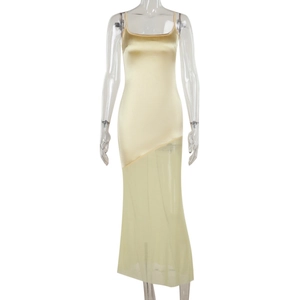 Detail of champagne satin dress showing slim fit design and sheer mesh patchwork hem