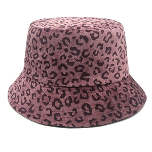 Detailed texture of the dark pink leopard print corduroy fabric on a bucket hat