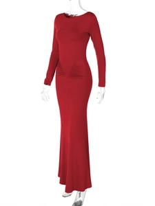 Detail of red slim-fit long-sleeve dress with elegant side ruching and crew neck