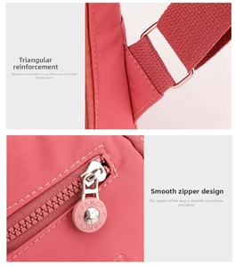 Detail of reinforced strap stitching and star-shaped zipper puller on pink nylon chest bag