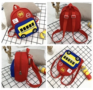 Detailed views of red cartoon school bus backpack for kids with traffic theme prints
