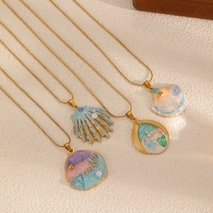 Marine style stainless steel necklace with ocean shell pendant and fine pearl inlay