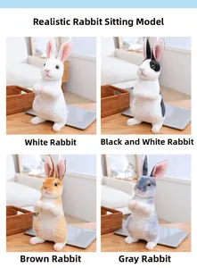 Macro detail of four realistic sitting rabbit plushies in white, spotted, brown and grey