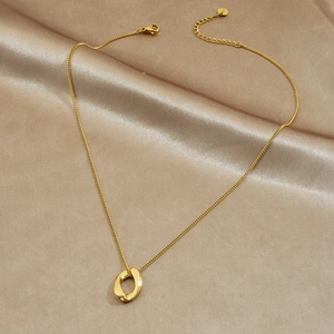 Elegant gold-plated stainless steel necklace featuring a twisted oval pendant with white zircon