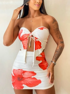 Two-piece floral print set featuring strapless tie-up top and bodycon skirt with red flowers