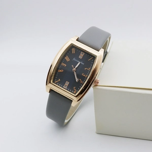 Elegant rectangular rose gold women's watch with black dial and grey leather strap
