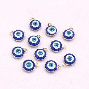 Detailed view of ten blue evil eye charms with gold-plated edges and small hanging loops