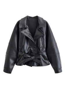Detail of black faux leather jacket featuring waist tie belt and lapel collar details